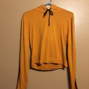 Orange crop hoodie with black on arm